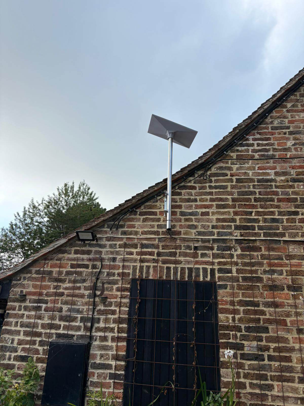 Starlink wall installation at farm house barn in Kent