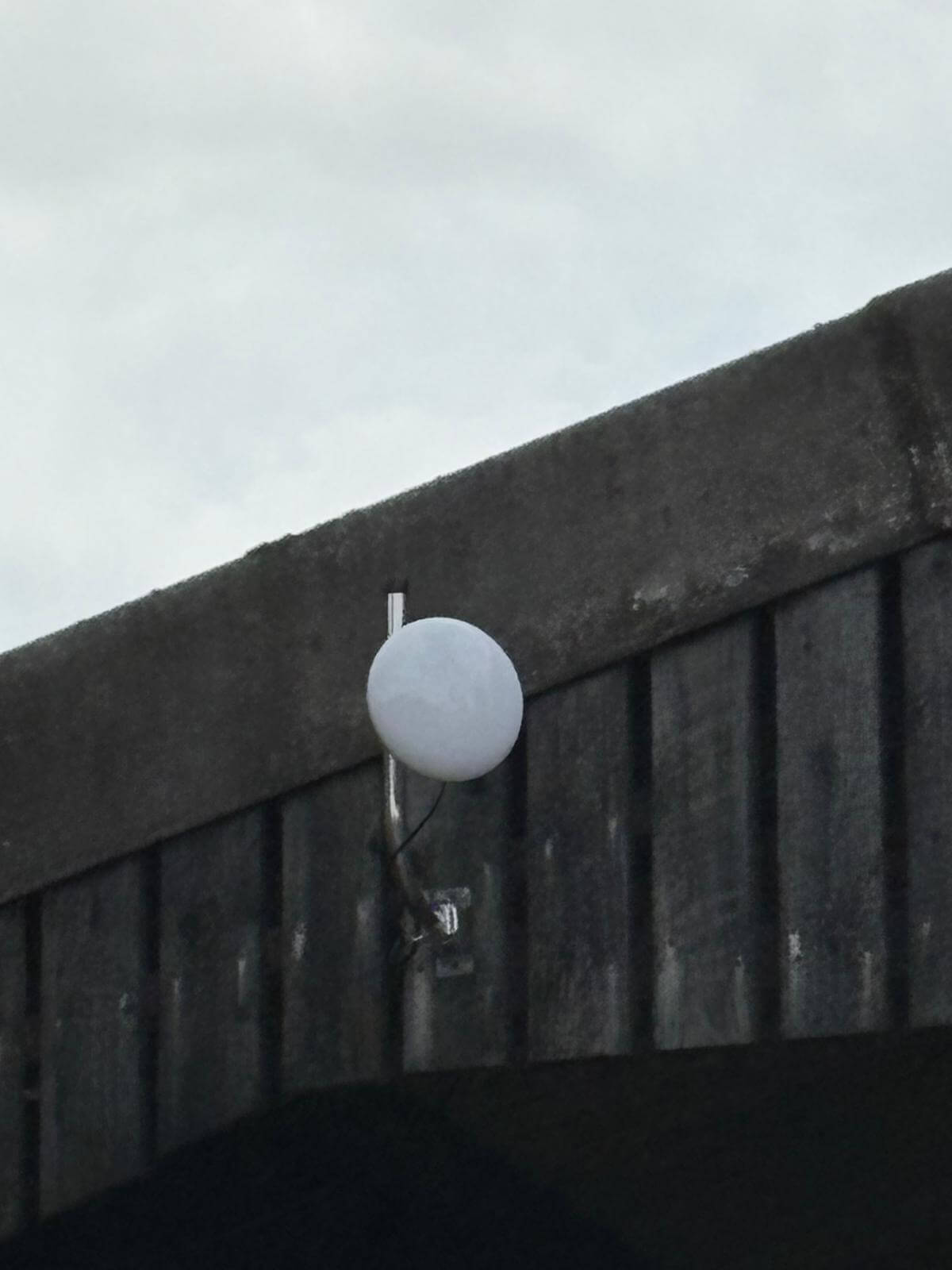 UniFi Ubiquiti wireless bridge installed on barn at farm in Stoke-on-Trent