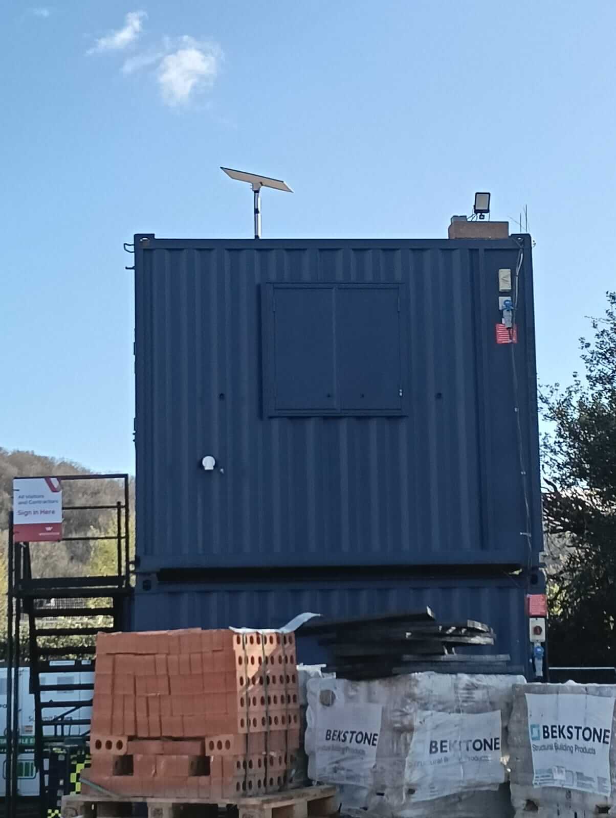 Starlink on site office container at new build housing development in Bristol